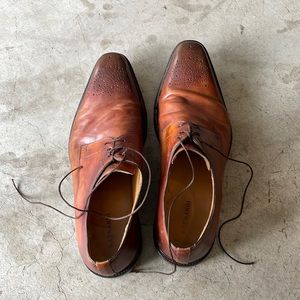 Brown leather “distressed” men’s dress shoes.
